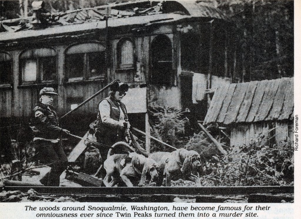 Train Car with police and bloodhounds walking near by