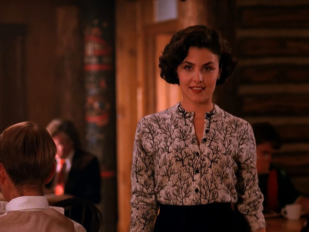 Audrey Horne walking through dining room at The Great Northern Hotel