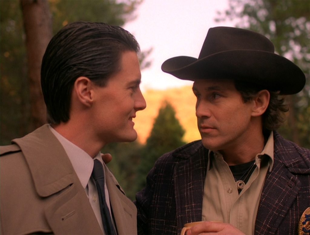 Agent Cooper and Sheriff Truman in the woods