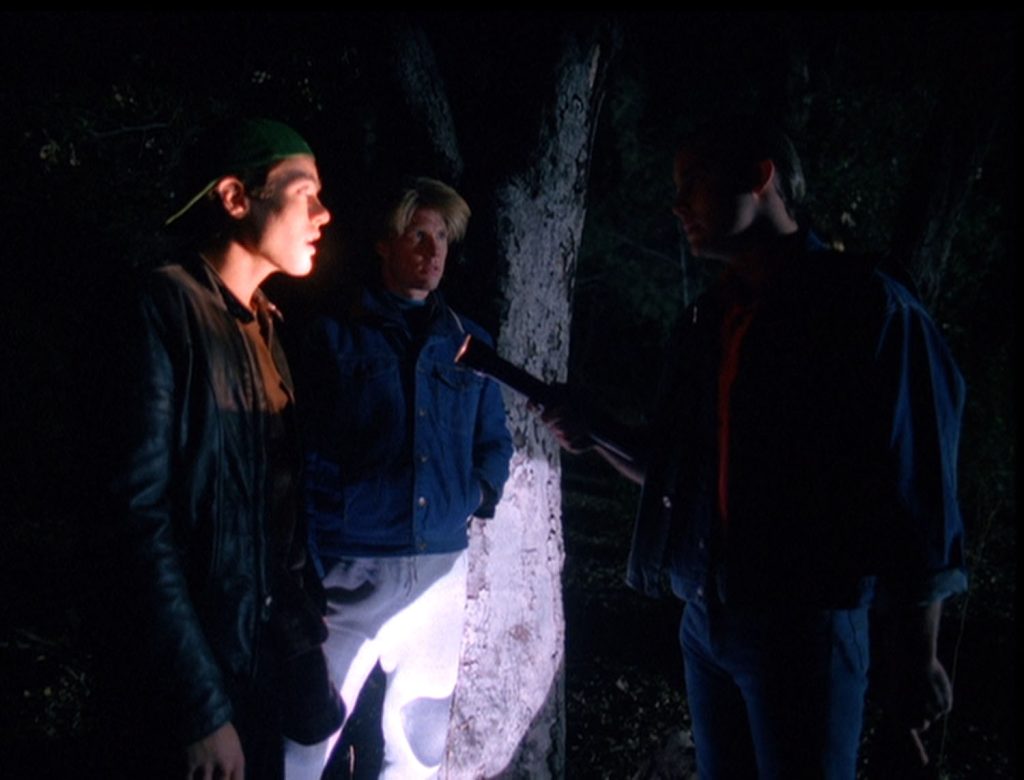 Leo, Bobby and Mike discuss in the woods