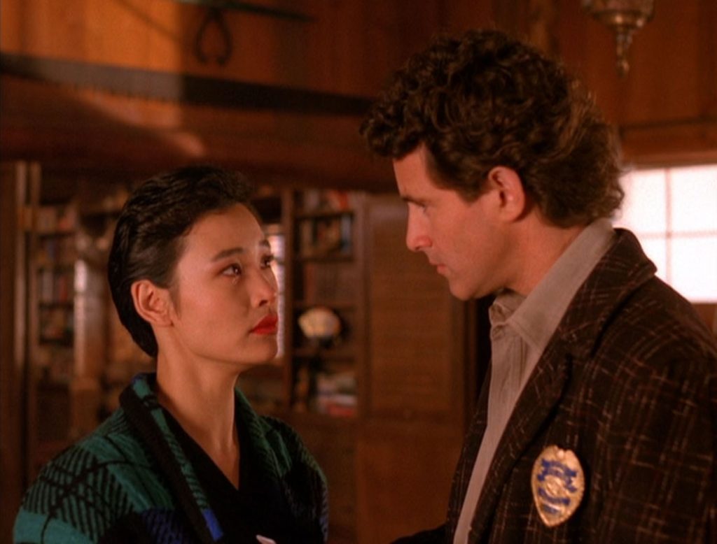 Josie Packard crying while speaking with Sheriff Harry S. Truman at Blue Pine Lodge