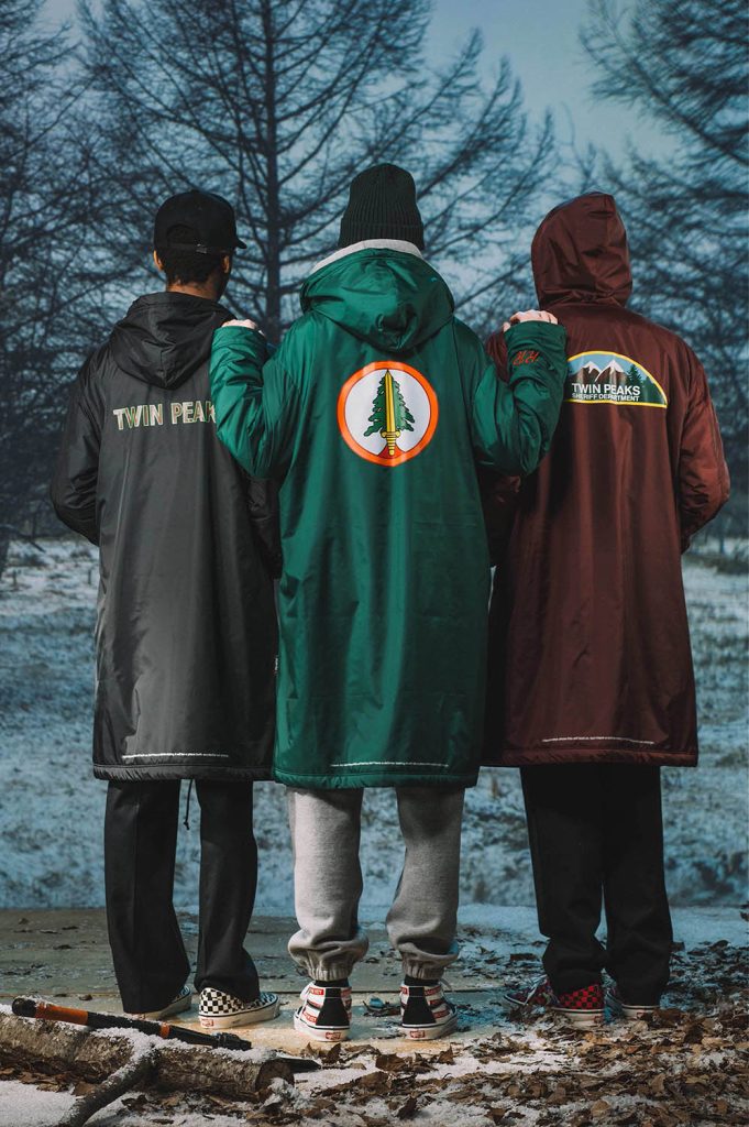 Three models wearing "Wonderful and Strange" Twin Peaks items