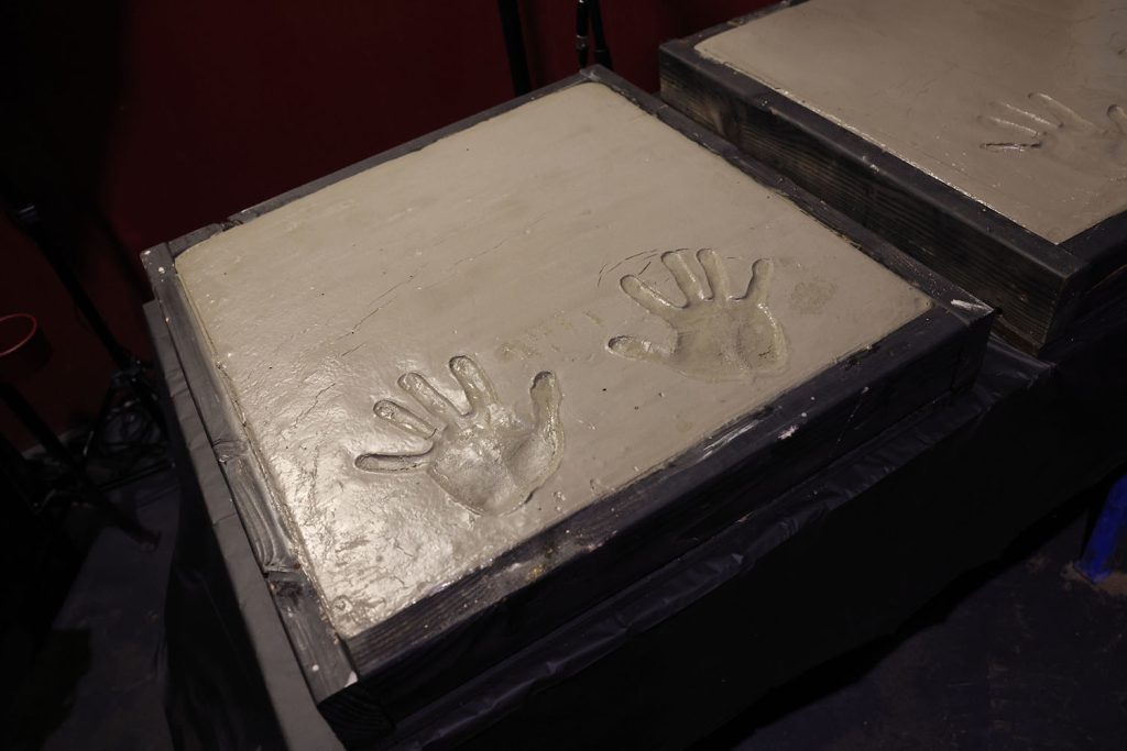 Handprints in a cement block