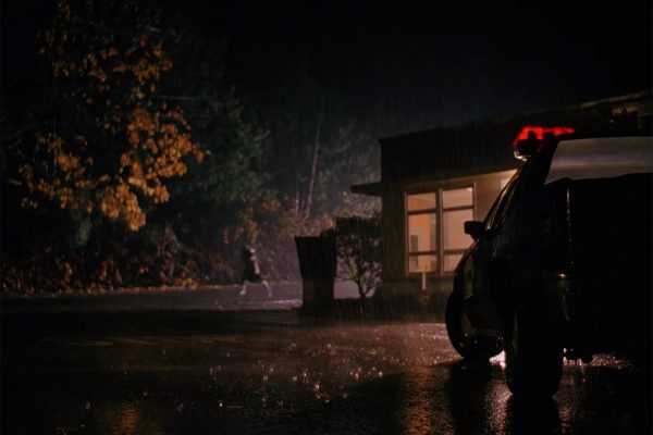 Leo Johnson running from Twin Peaks Sheriff's Department at Night in Rain