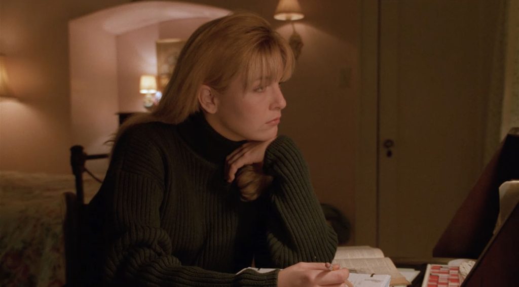 Laura Palmer working on homework at her desk