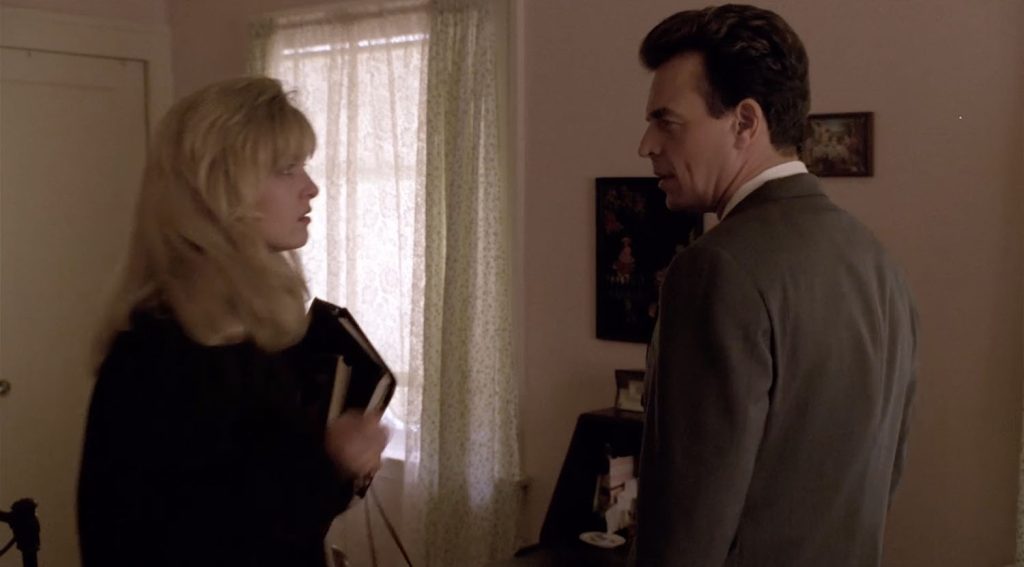 Leland Palmer confronts Laura Palmer in her bedroom