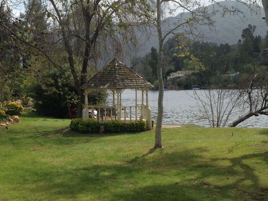 Gazebo by a lake and surrounded