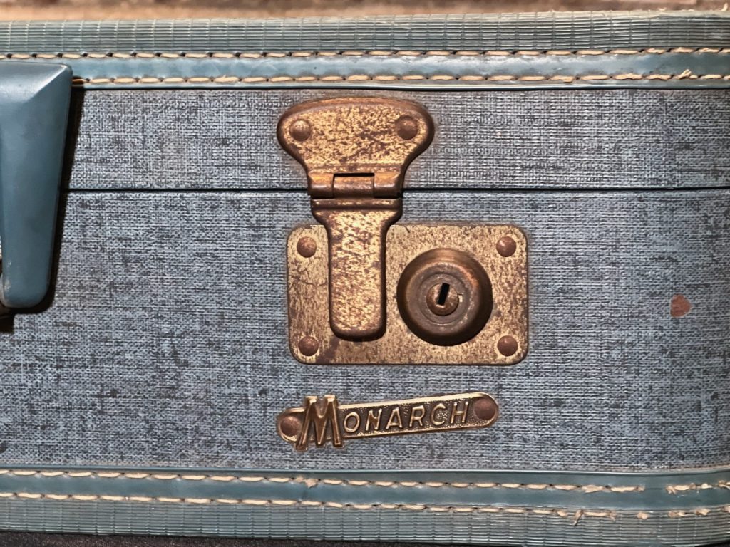 Suitcase latch with Monarch Logo