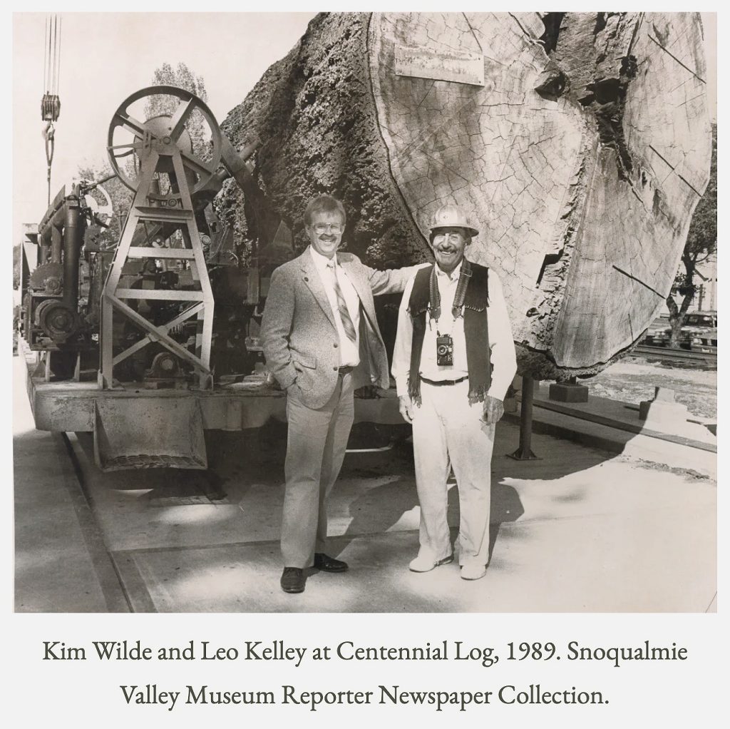 Ken Wilde and Leo Kelly by the Centennial Log