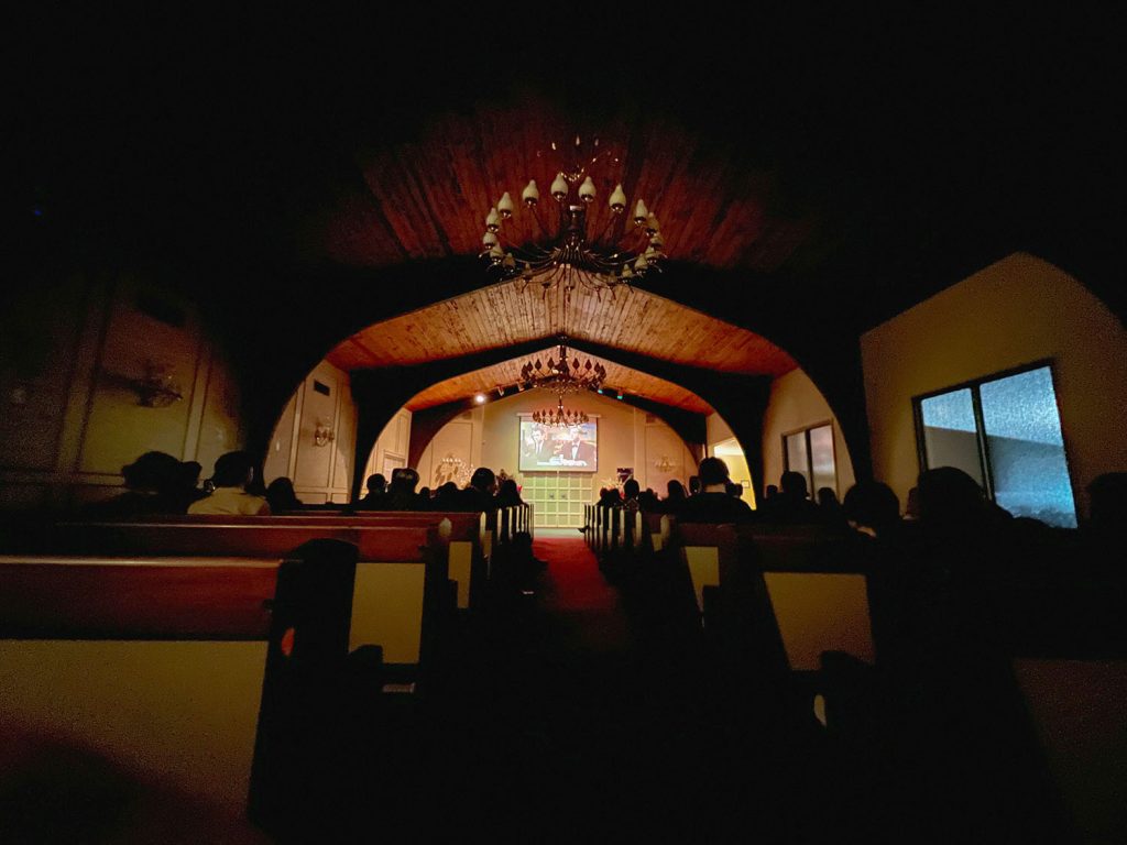 Agents Desmond and Stanley, as seen from the back of the chapel