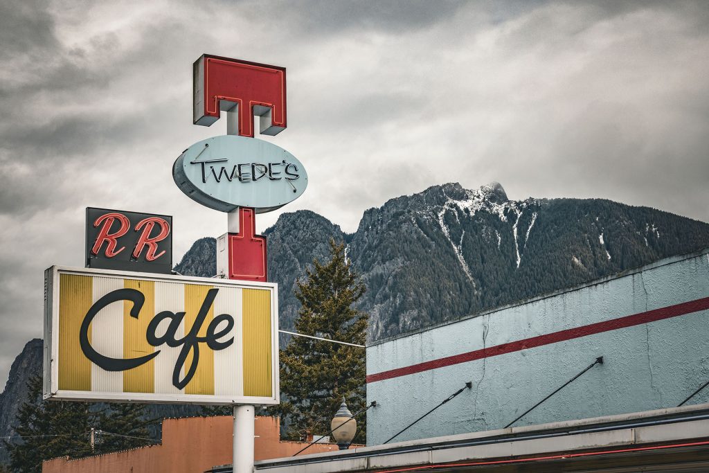 Twede's Cafe sign with Mount Si in the distance.