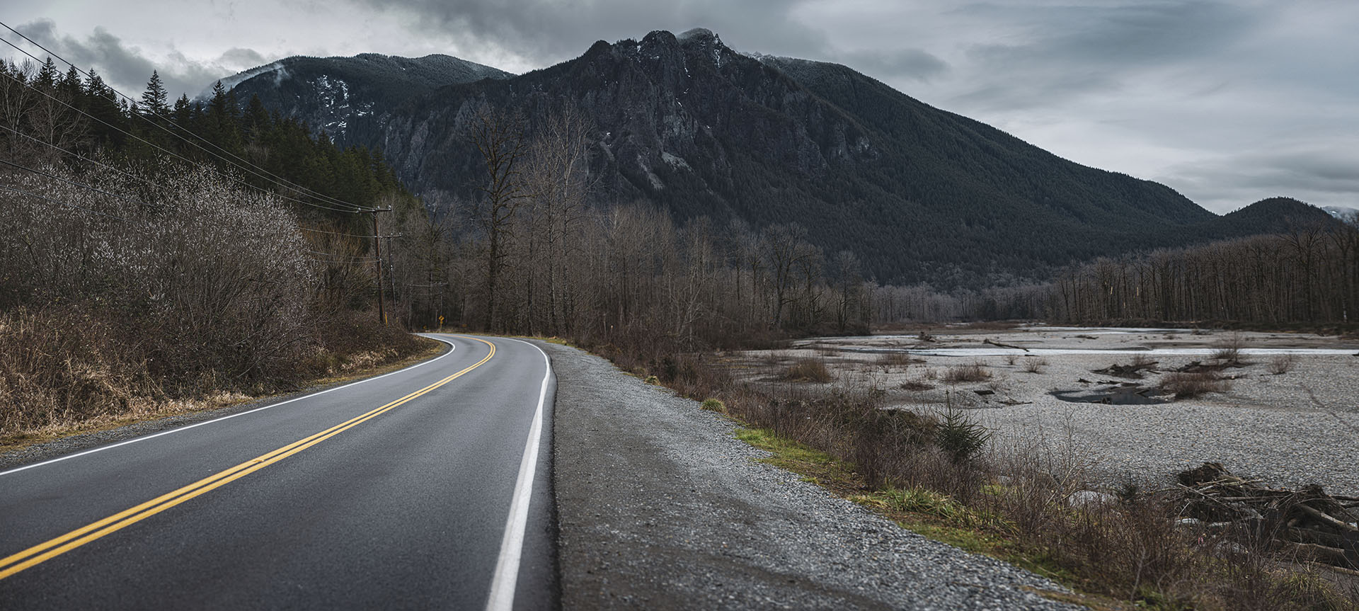 Welcome to Twin Peaks sign spot along Reinig Road in Snoqualmie, Washington with Mount Si looming in the distance.