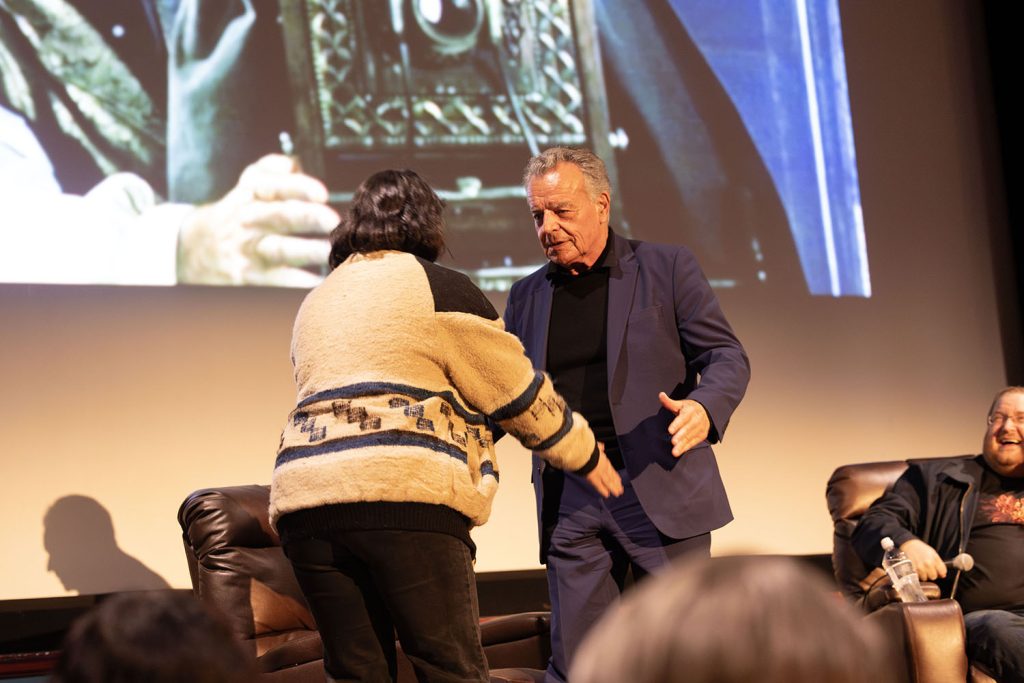 Ray Wise Demonstrating a Business Hug