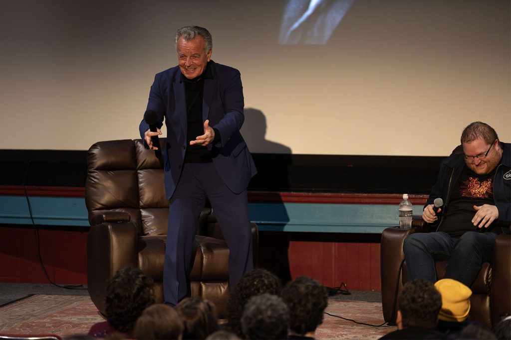 Ray Wise imitates Sean Connery handing a bowl of fruit