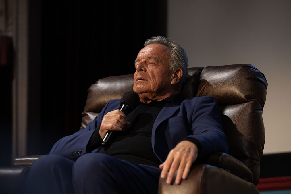 Ray Wise sitting in a recliner