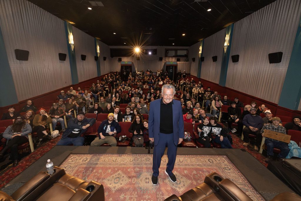 Ray Wise posing with the audience inside the North Bend Theatre