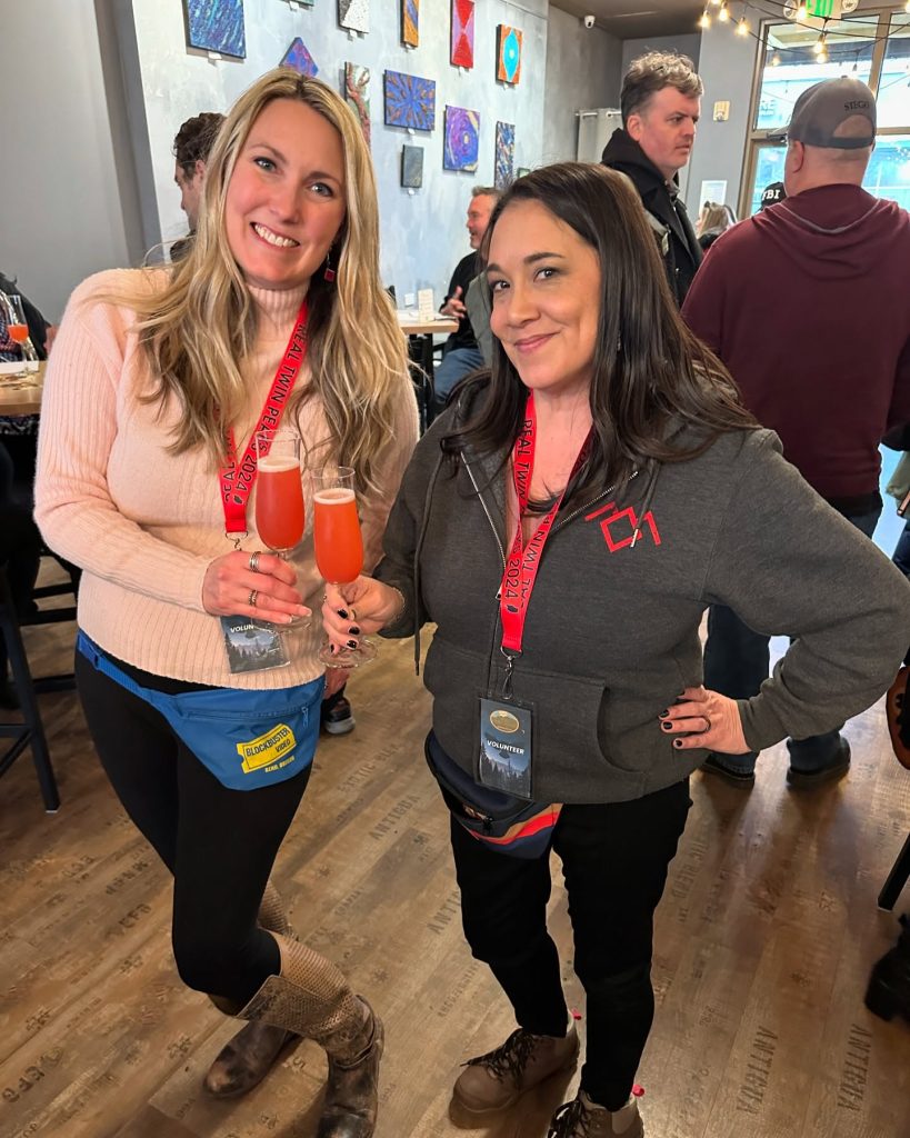 Jessica and Laurie holding Audrey's Heart beverages at Wm Grassie Wine Estates at Snoqualmie Ridge