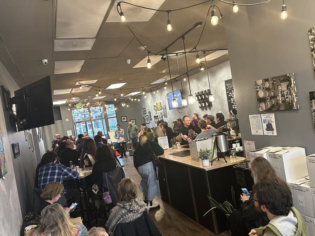 Inside of William Grassie Estates Wine tasting room with people sitting at tables