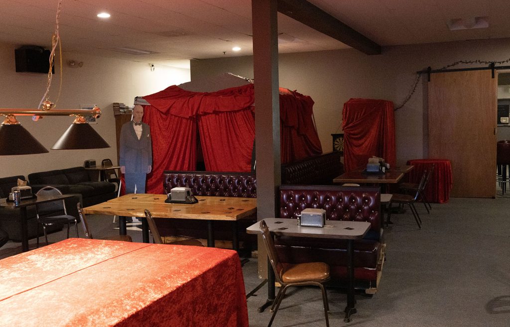 Inside of Sno-Valley Eagles with booths and a Red Room