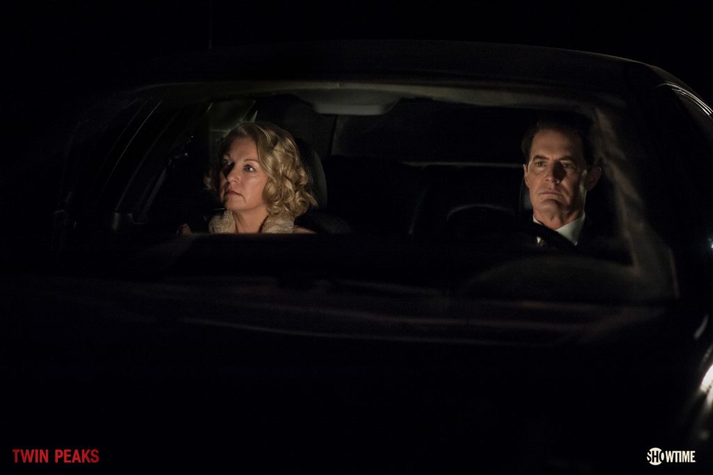 Carrie Page and Richard driving at Night