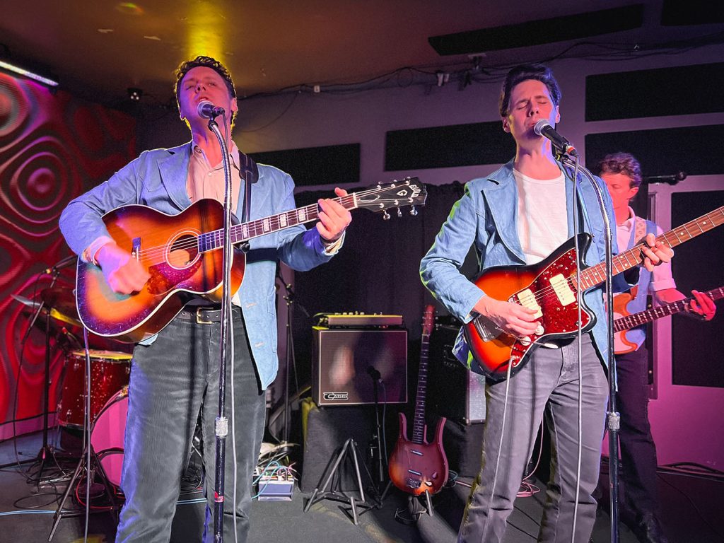 Page Burkham and Jack Torrey performing on stage