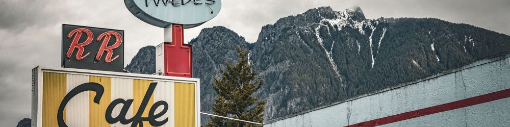 Twede's Cafe sign with Mount Si in the distance.