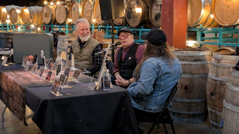 Vinnie Guidera, Jeff Moore and Steven Miller sitting behind a table