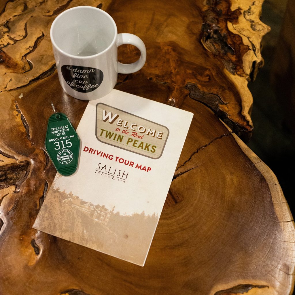 Coffee mug, key chain and map