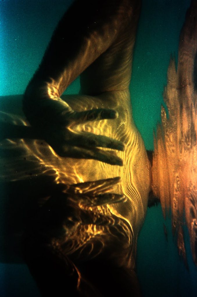 Photo of Hands Underwater