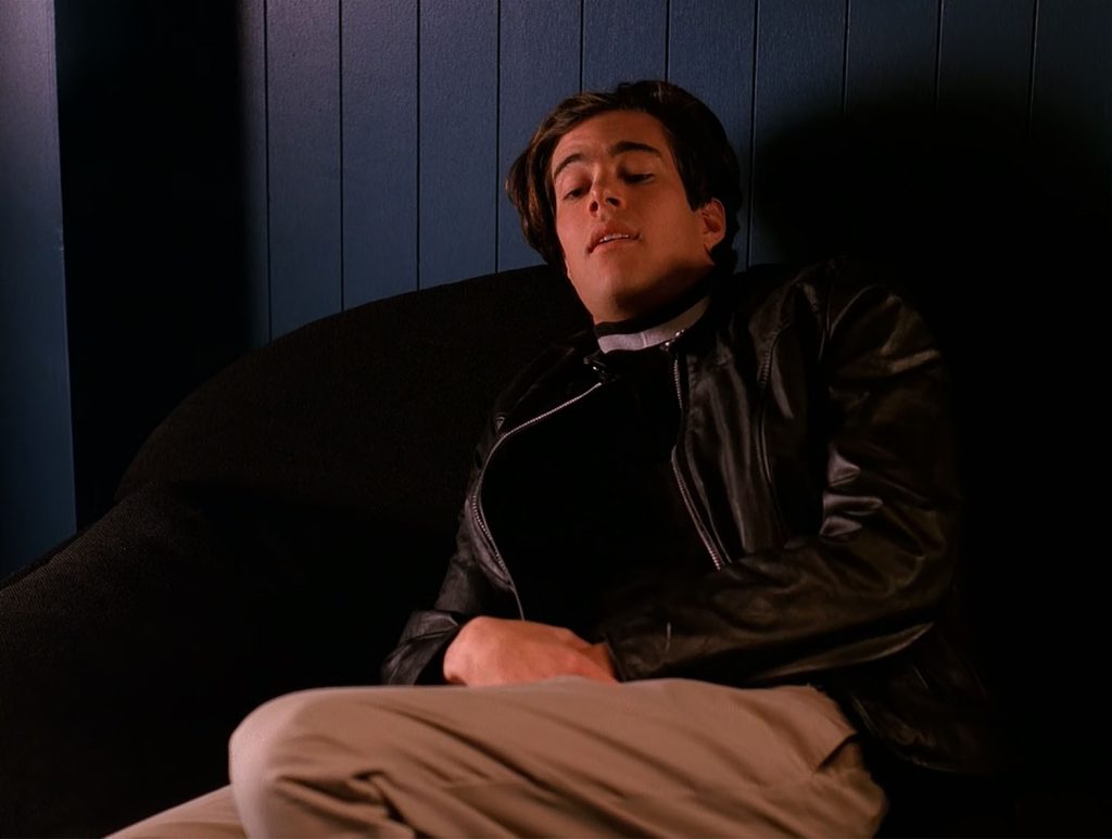 Bobby Briggs reclining on a chair