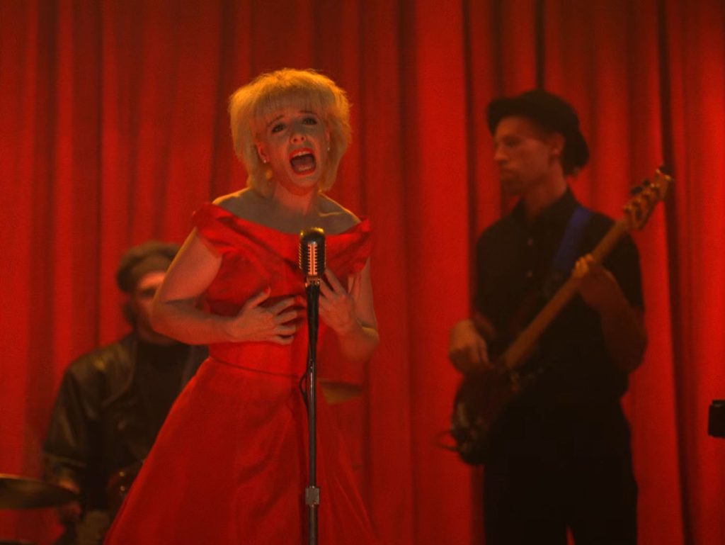Julee Cruise singing with a band