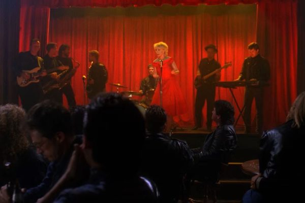 Julee Cruise on stage with a band