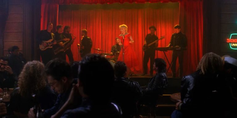 Julee Cruise on stage with a band