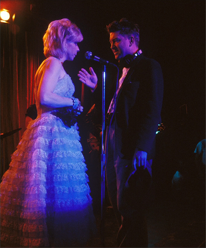 David Lynch giving direction to Julee Cruise on stage