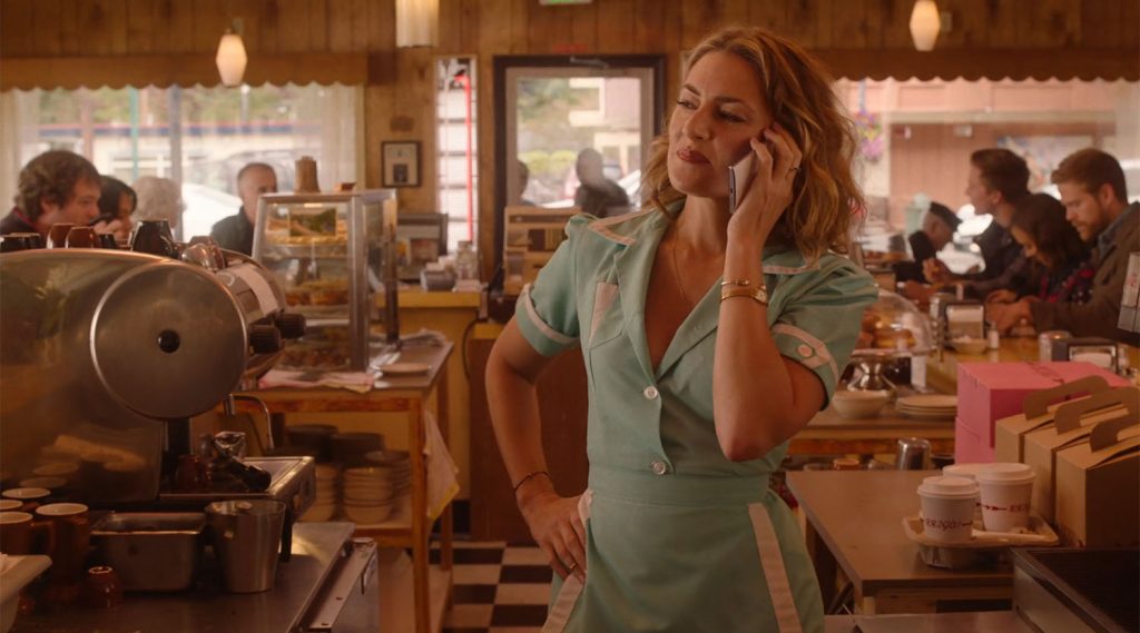 Shelly Johnson speaking on the phone at the Double R Diner