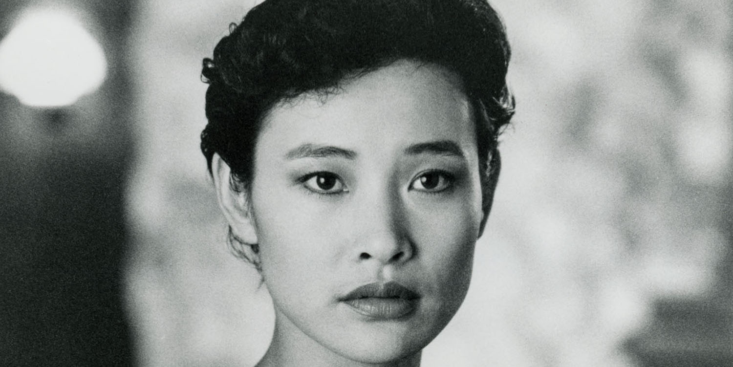 Josie Packard in a robe at the Blue Pine Lodge