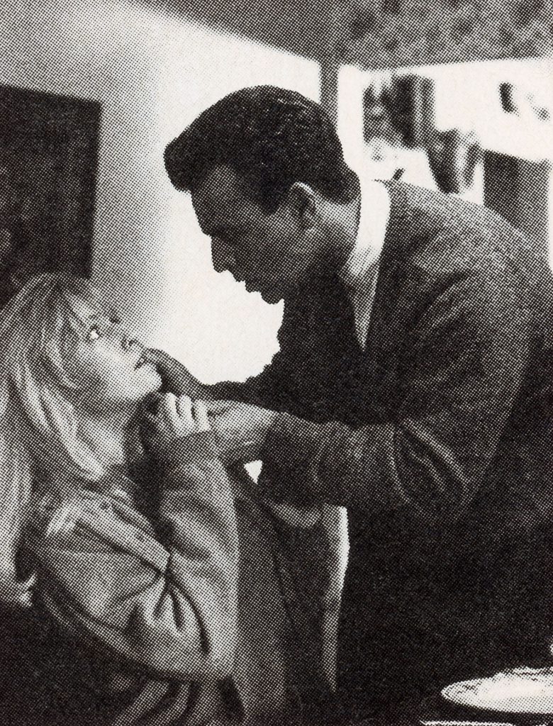 Leland Palmer confronting Laura Palmer at the dinner table