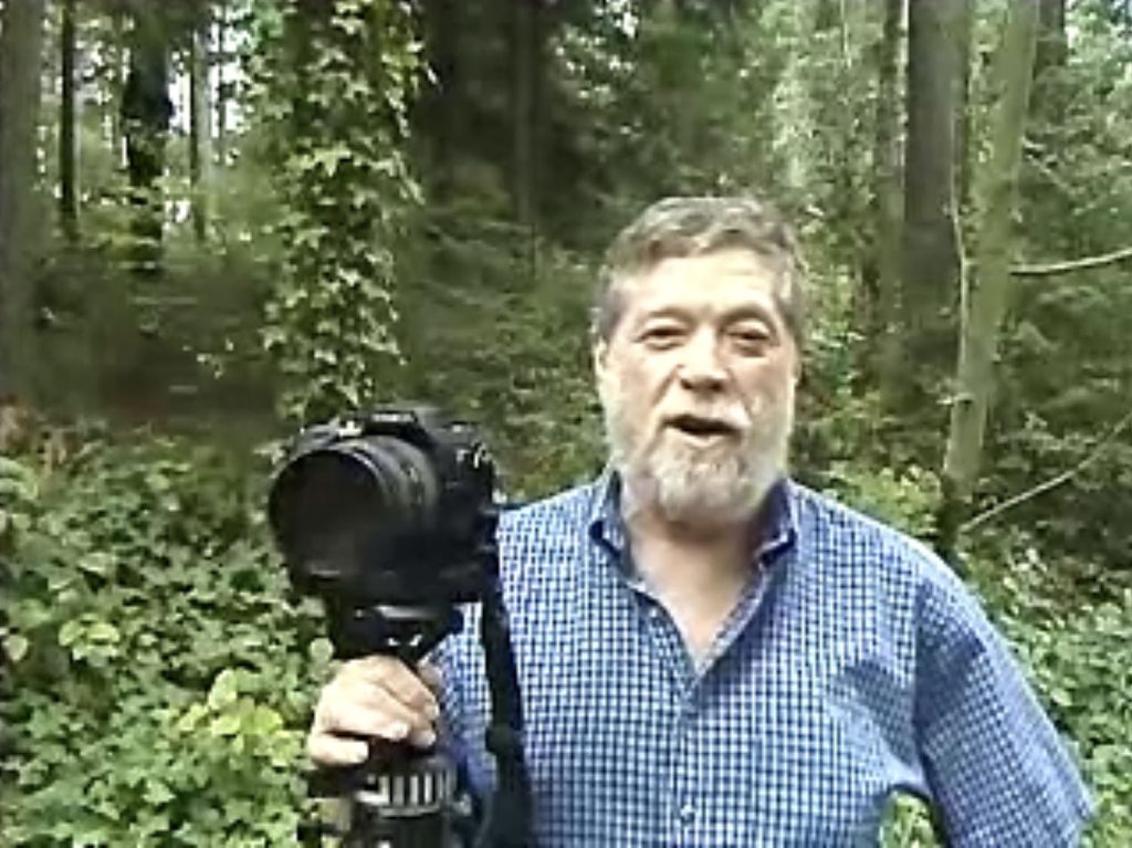 Gary Greene holding a camera