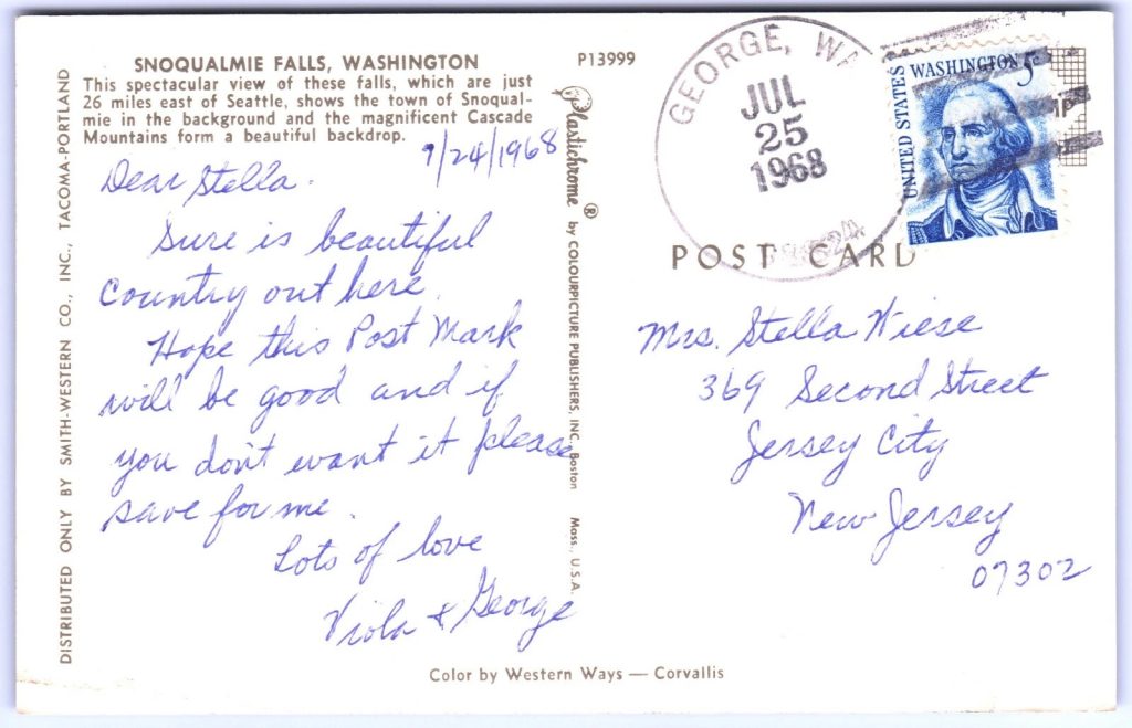 Back of postcard with handwritten ink and a cancel stamp