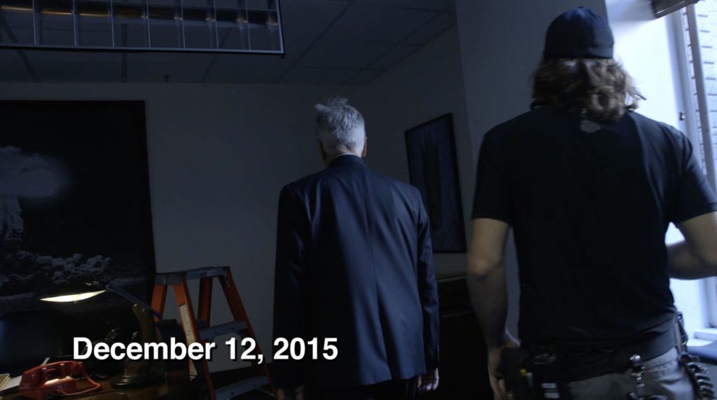David Lynch walking onto the set of his office