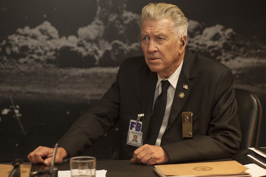 David Lynch as Gordon Cole at his desk