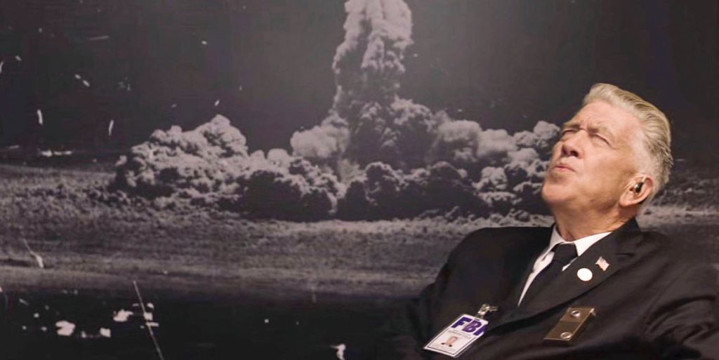 David Lynch as Gordon Cole at his desk