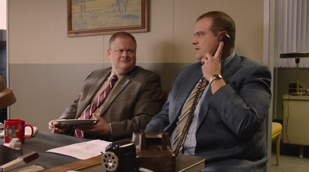 Fusco brothers talking on the phone