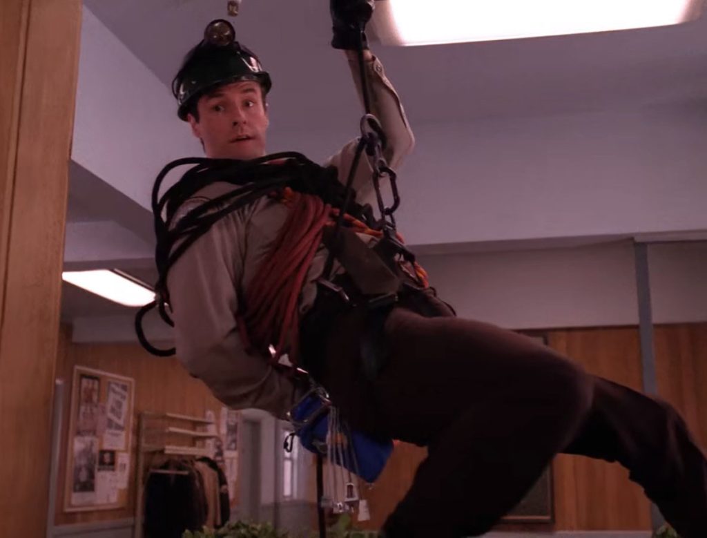 Andy repelling from the ceiling of Twin Peaks Sheriff's Department