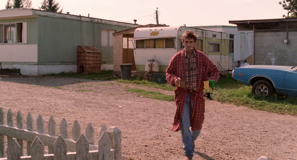 Carl Rodd carrying three cups of coffee