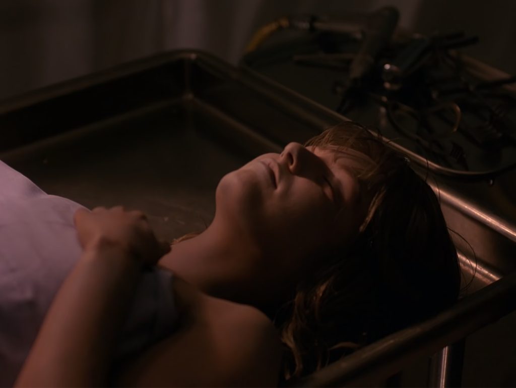 Laura Palmer laying on autopsy bed