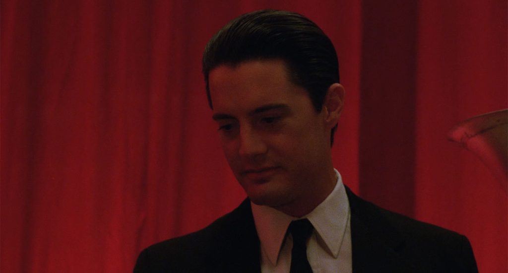 Dale Cooper looking down at Laura Palmer