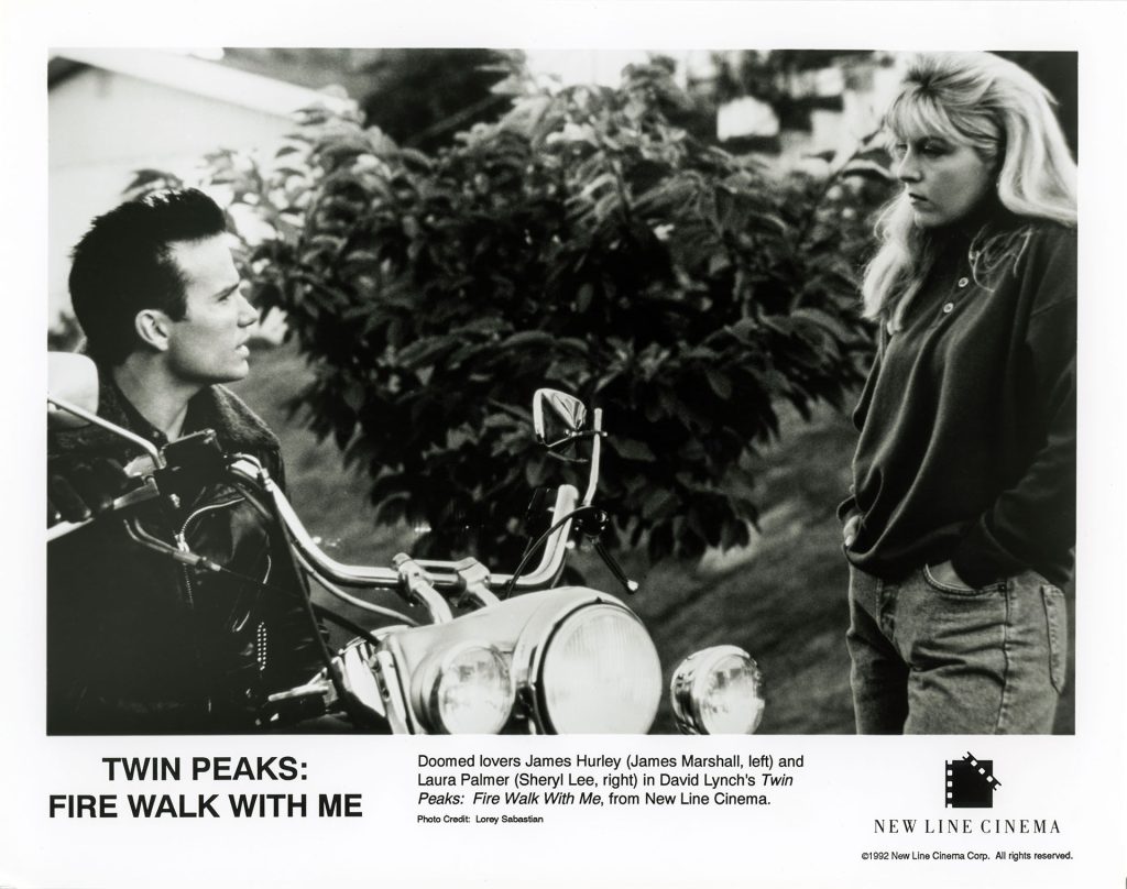 James Hurley (James Marshall) and Laura Palmer (Sheryl Lee) discuss outside Palmer's home in Twin Peaks: Fire Walk With Me