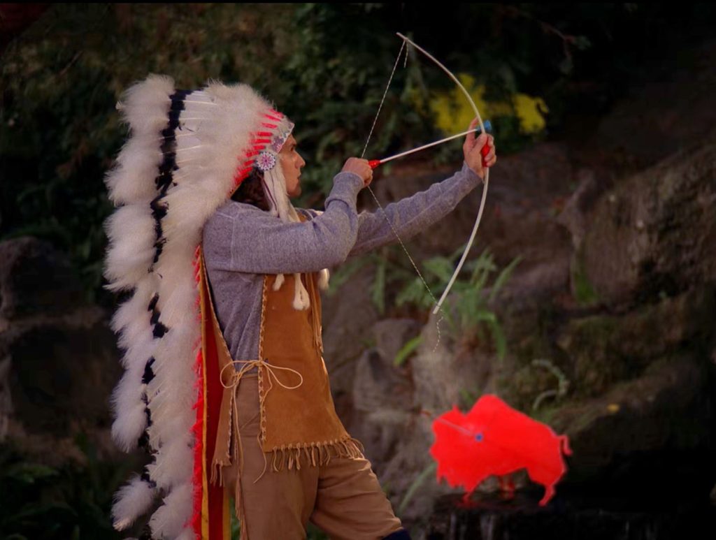 Johnny Horne with bow and arrow