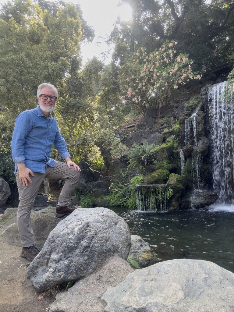Steven standing by Meyberg Waterfall